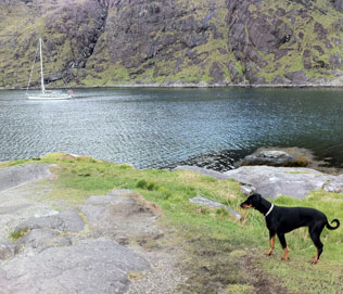 Breezy & our boat in Greece